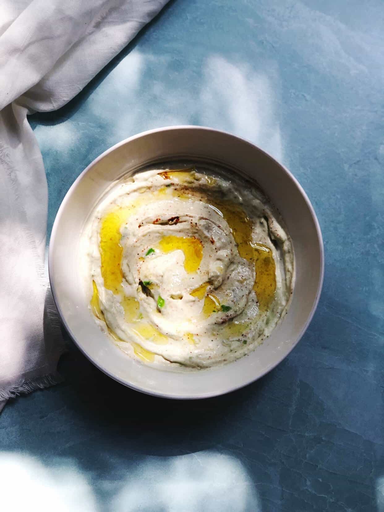 Bowl of avocado greek yoghurt dip on a table